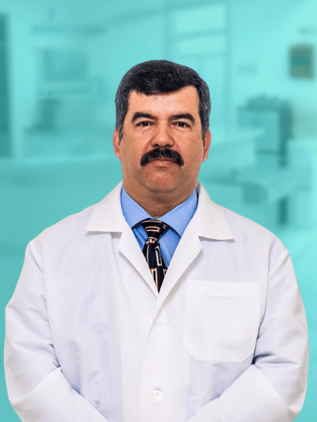 Headshot of Dr. Contreras with TreVita Stem Cell Treatment In Mexico. With Branded Color in background.